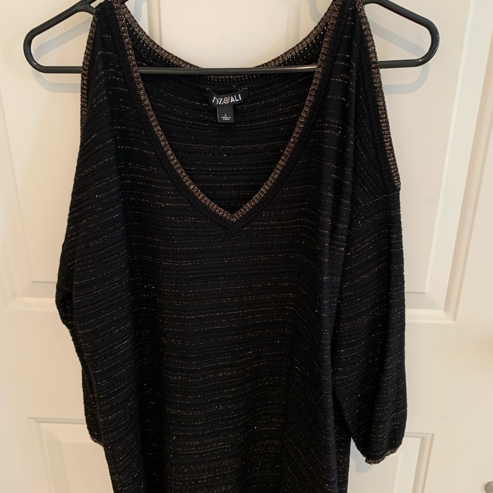 Black sweater with gold thread